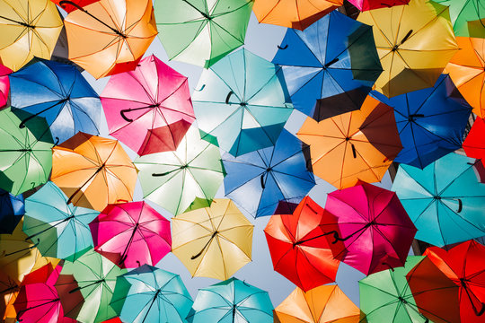 Low Angle View Of Colorful Umbrellas Hanging Outdoors