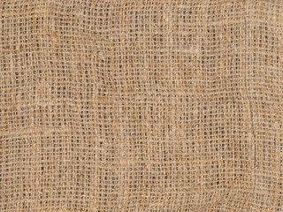 Abstract background burlap. Close-up of an interlacing of threads.