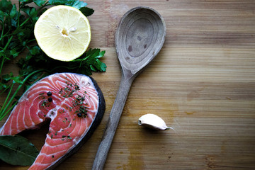 Fresh raw uncooked salmon fish fillet. Healthy eating concept.