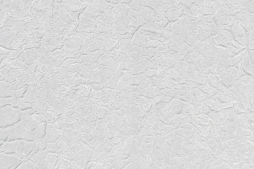 Gray shabby background. Wrinkled paint texture.