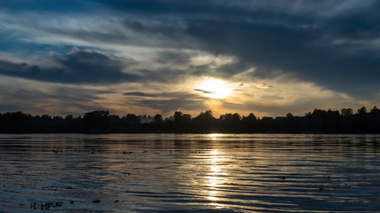 Naklejka premium Scenery with river in the background light of the twilight sky