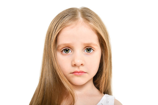 Portrait of a beautiful sad little girl, closeup, isolated on white background