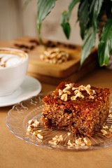 Sweet nuts with honey and cinnamon. Authentic Mediterranean dessert dish photography.