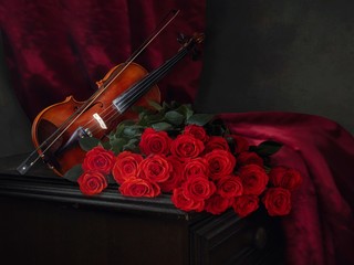 Still life with violin and luxurious bouquet of red roses © Iryna
