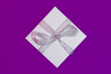 White gift boxes on a colorful background