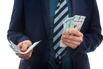 businessman gives bribe or pay, in isolation. UAH. 1000 new banknote Ukrainian money