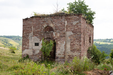 Fototapeta na wymiar The ruins of an old abandoned castle, church