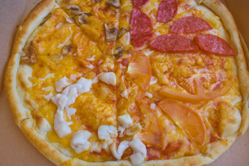 pizza close-up, cut into pieces