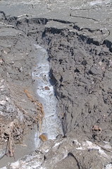 Kalush, Ukraine, 2020: Potassium salts withdrawal from soil. Gray soil, ore.
