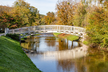Fototapeta na wymiar Bridge and Riverwalk around Bade-Baden village