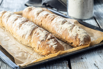 Fresh whole grain bread baguette.