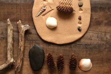 Modeling with salt dough on the kitchen table. Natural materials for the game, the natural composition of the product. Creative development of children in the period of self-isolation