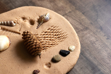 Modeling with salt dough on the kitchen table. Natural materials for the game, the natural...