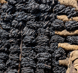 Coal store, with black and gray texture, copy-space, black background