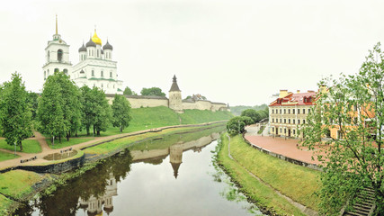 Panoramic view of Pskov Kremlin on the Velikaya river. Ancient fortress. The Trinity Cathedral in summer. Pskov. Russia.