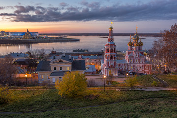 Fototapeta na wymiar Church of the Cathedral of the Blessed Virgin in Nizhny Novgorod on the background of a beautiful sunset in autumn