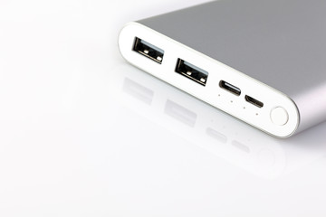 An additional stand-alone power bank for charging mobile devices. External battery isolated on a...