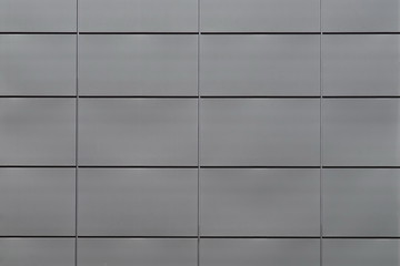 Gray background from rectangular tiles. Idea for a designer