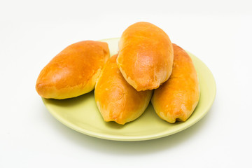 delicious baked pies on a plate