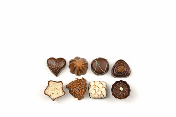 Assorted Various Chocolates on White Background