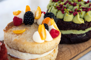 Close up of a colorful cake with fruits