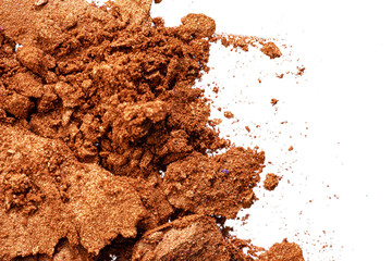 Make up background of mixed colored smashed eyeshadows close up