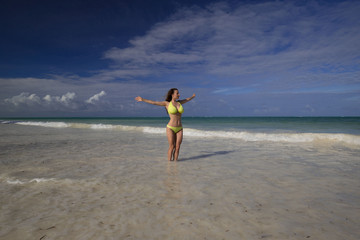 Fototapeta na wymiar Zanzibar, woman, yellow bikini, sexy