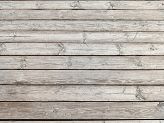 Dark dilapidated cracked boards. Wood old table. Rustic timber texture. Weathered oak planks. Interior decoration. Natural wooden background, pattern.