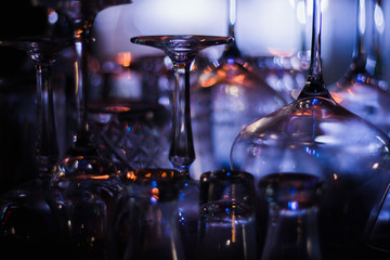 wine glasses on a bar