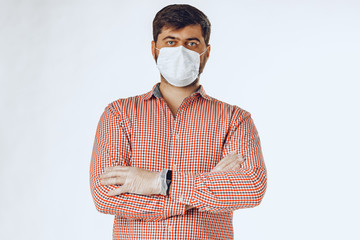 Man in the medical mask and medical gloves for protection. Close up.