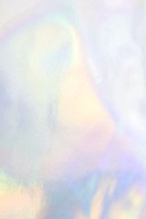 Abstract holographic purple pink background. Liquid neon rainbow foil in unicorn style. Marble...