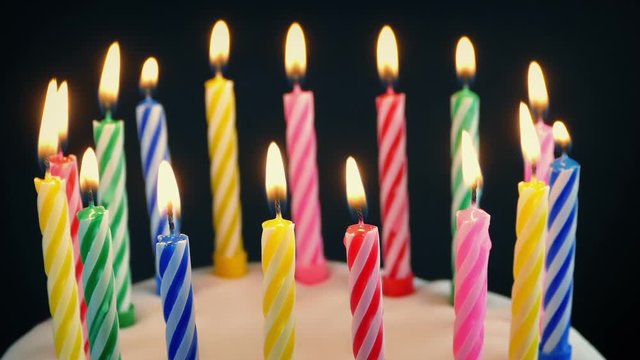 Birthday Candles On Cake Are Blown Out With Wispy Smoke