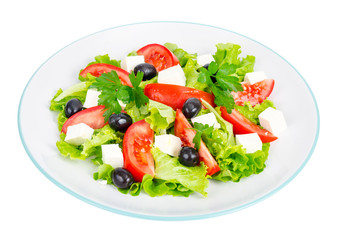 Healthy lifestyle. Vegetable diet salad with olives and goat cheese on white background.