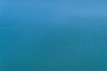 Blue turquoise transparent water surface
