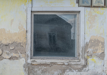 Fototapeta na wymiar old window on a wall