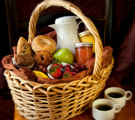 Breakfast Basket with Bagels, Muffins, Scones, Fruit, Coffee, and Juice for breakfast in Bed