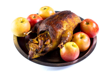 Baked duck with herbs and apples.