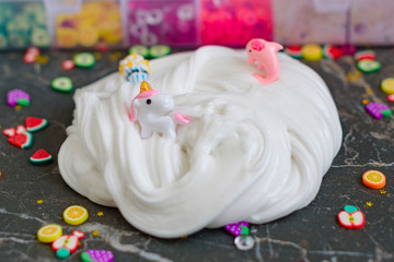 homemade toy white butter slime and accessories for decoration
