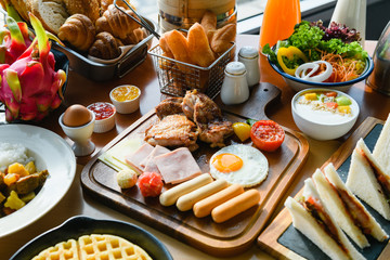 Plentiful breakfast table at hotel close up