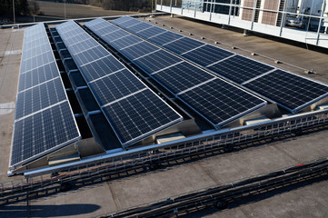 Solar panels on the roof of a building in detail.