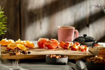 Breakfast on the table in the light of the morning sun