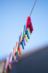 colorful clothespins on a rope