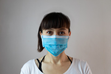A woman wearing a face mask  for prevent  dust the spread of germs and bacteria and avoid infections corona virus. Hygiene concept