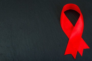 World AIDS Day, red ribbon, symbol.