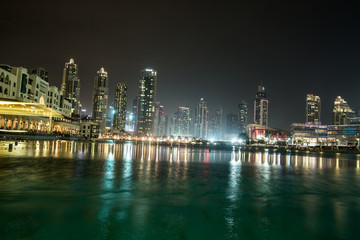 Fototapeta na wymiar Dubai downtown night scene with city lights