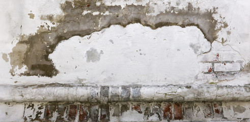 Horizontal long background texture of an old plastered wall. Photo walls of blue , orange, white, gray, Sepia colors. Old plastered wall with cracks. Vintage Background with space for text.