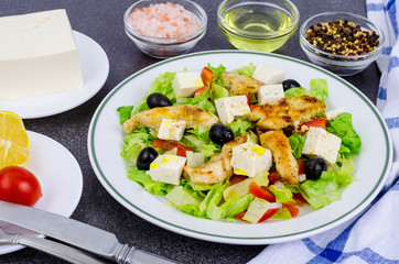 Vegetable salad with tofu and chicken breast.