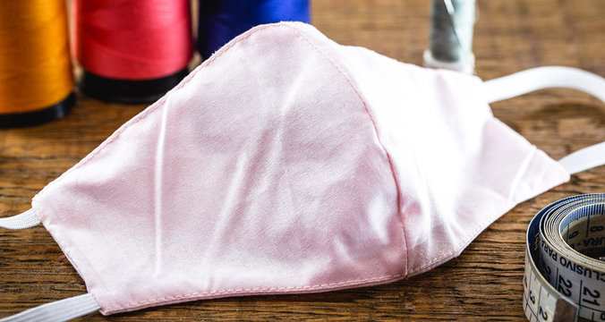 homemade breathing mask made by a Brazilian artisan. Business opportunity during the coronavirus pandemic - Powered by Adobe