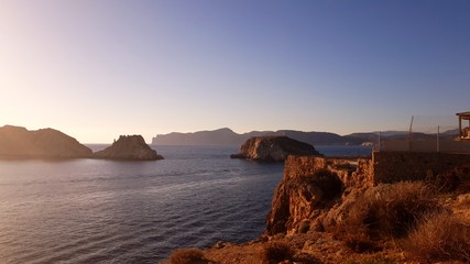 Sunset photos at beachfront/oceans edge/ island silhouettes