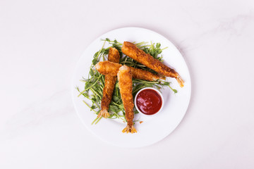 Tempura deep fried shrimp fish with tomato sauce. street food.